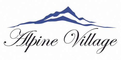 the logo for alpine village with a mountain